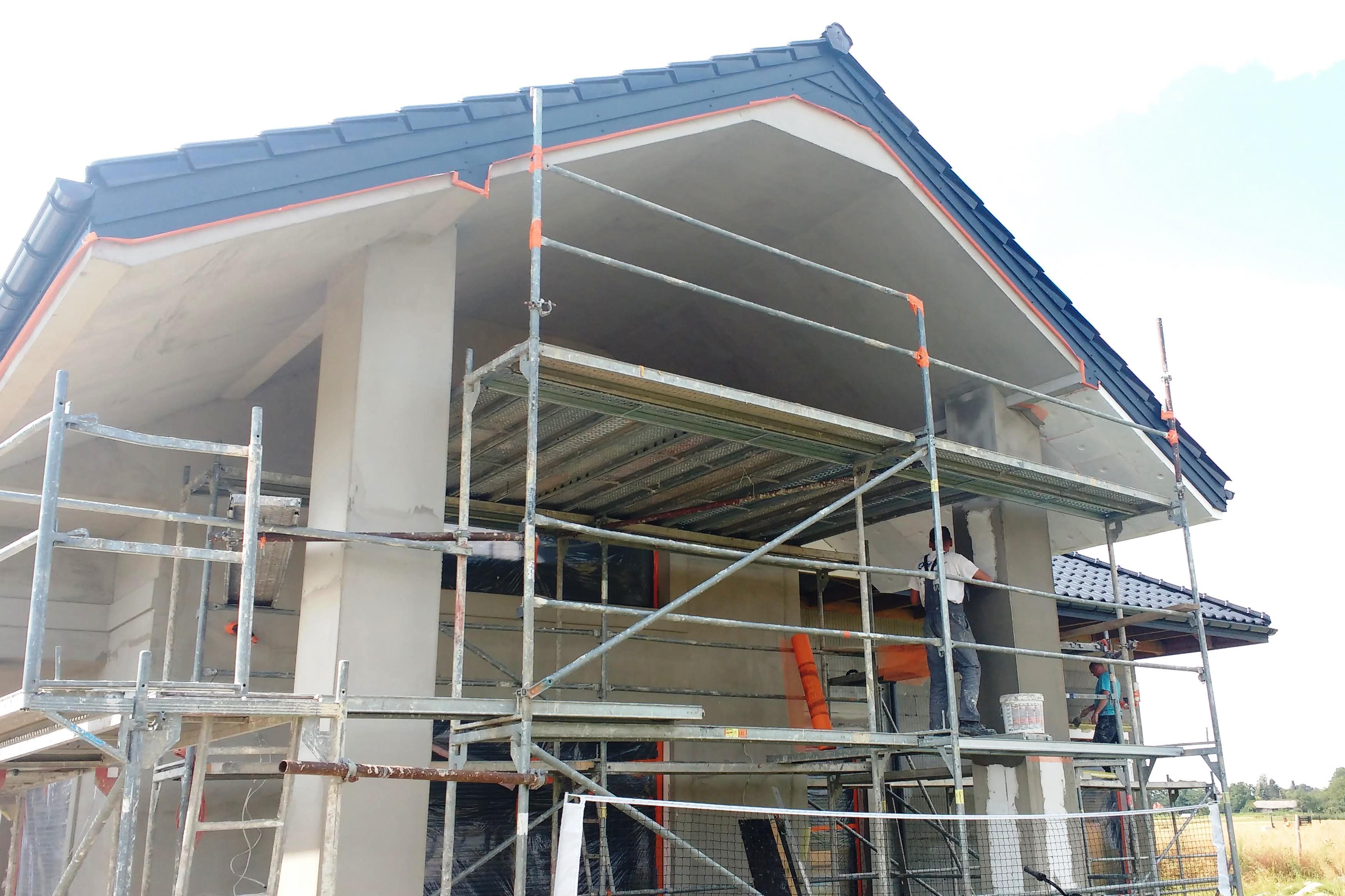 Docieplenie budynku jednorodzinnego – elewacja w trakcie prac, Lublin